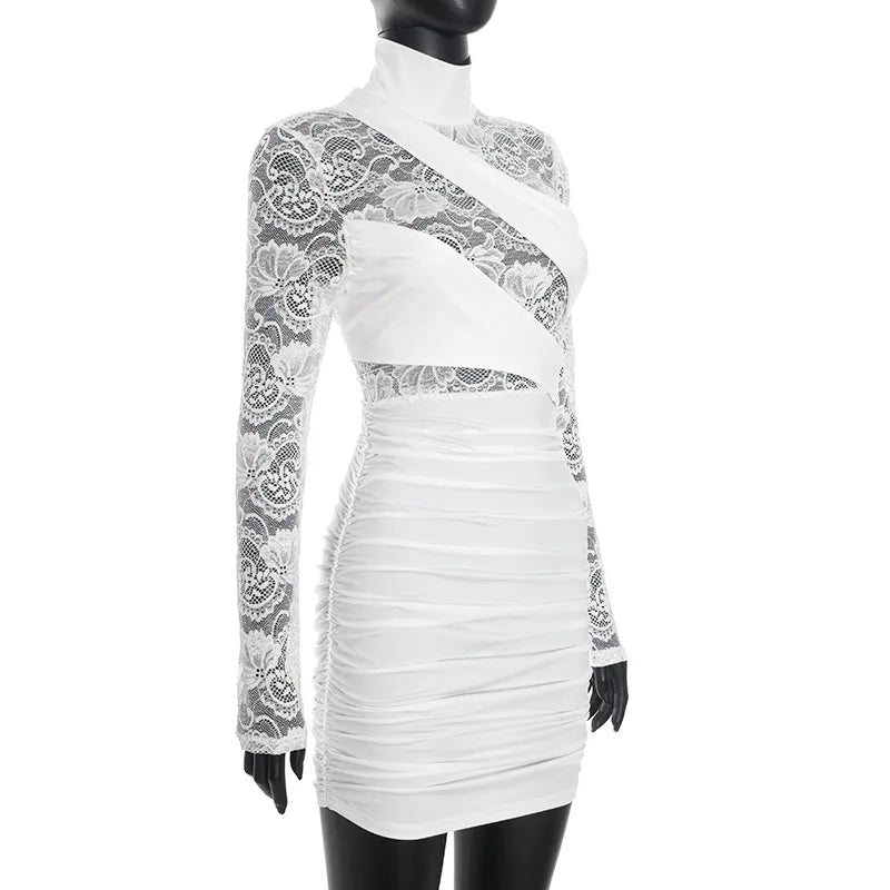 White dress with lace detailing on a mannequin against a white background