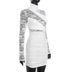 White dress with lace detailing on a mannequin against a white background