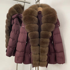 Purple puffer jacket with brown fur hood and collar