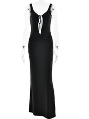 Black evening gown with lace details on a white background