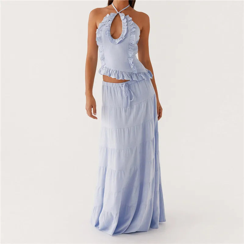 Light blue ruffled top and long skirt set on a white background