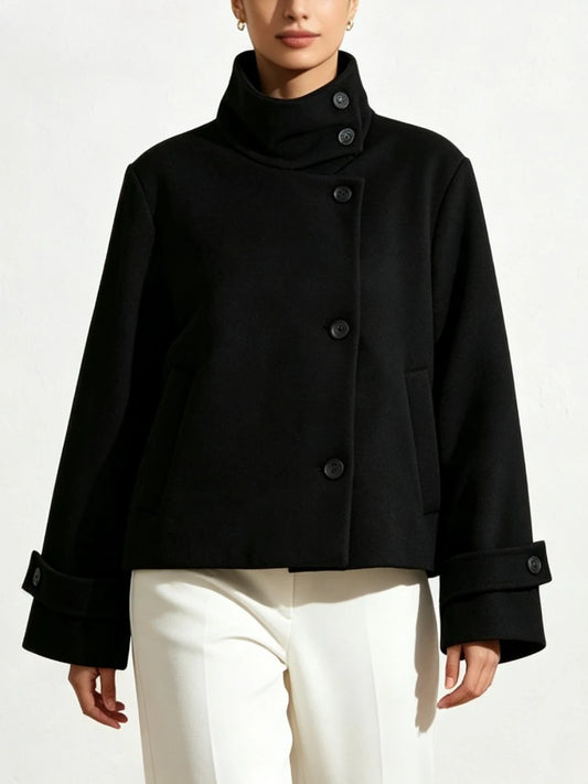 High neck solid cropped jacket with asymmetrical button closure and cuffed sleeves.