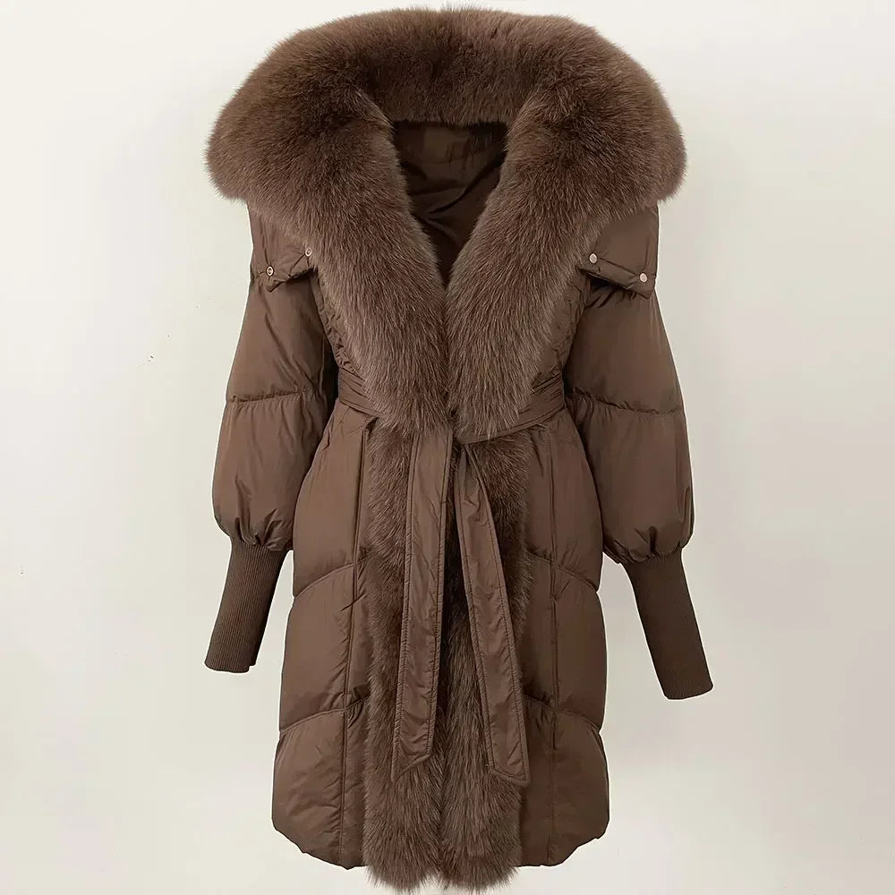 Brown winter coat with fur collar and belt on a white background