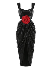 Black evening gown with a red floral embellishment on a white background