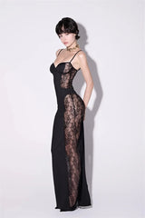 Woman wearing a black lace evening gown