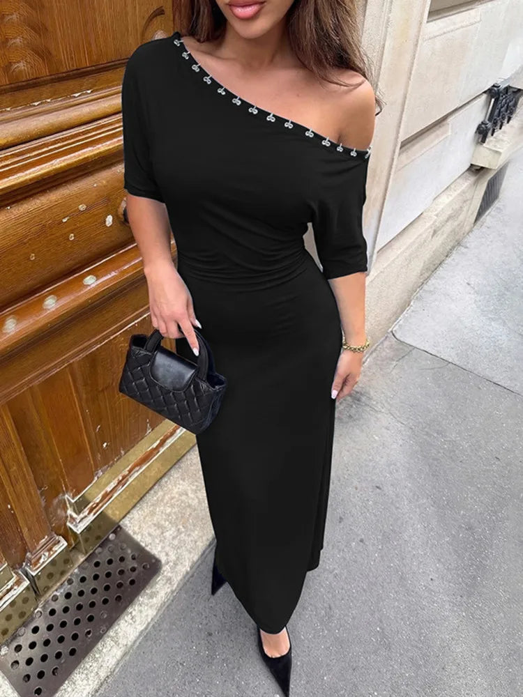 Diagonal collar ruched bodycon maxi dress with metallic stud detail in black