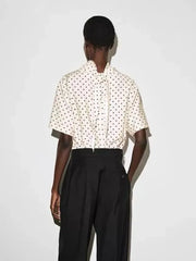 Polka dot mock neck short sleeve top back view