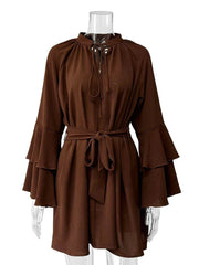 Brown dress on a mannequin against a white background