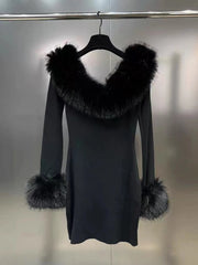 elegant black mini dress with faux fur accents
