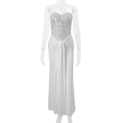 White evening gown with silver sequin bodice on a mannequin