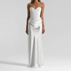White strapless gown on a plain background