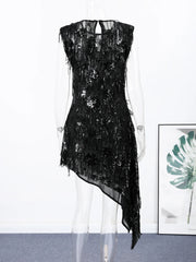 Black sequin dress on a mannequin against a white background