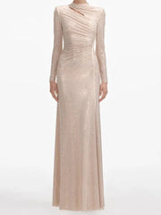 Apricot evening gown with long sleeves on a white background
