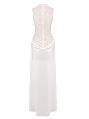 White dress with lace detailing on a white background