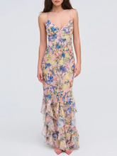 Watercolor print spaghetti strap trumpet hem ruffled gown front view