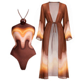 Halter neck one-piece swimsuit and matching long kimono cover-up with wavy gradient print, displayed side by side.
