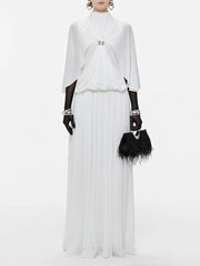 White chiffon maxi dress with cape sleeves and jewel buckle