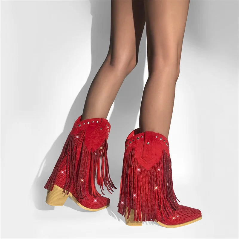 Red fringed boots with wooden soles on a white background