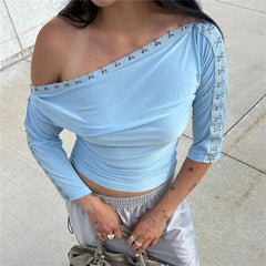 Light blue off shoulder top with eyelet detail
