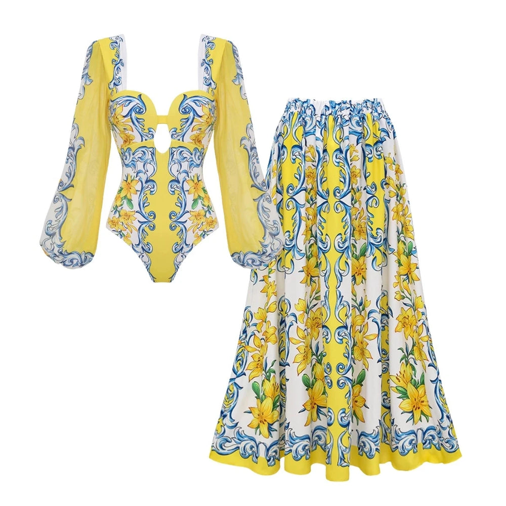 Balloon sleeve square neck cutout bodysuit and print maxi skirt set laid flat.