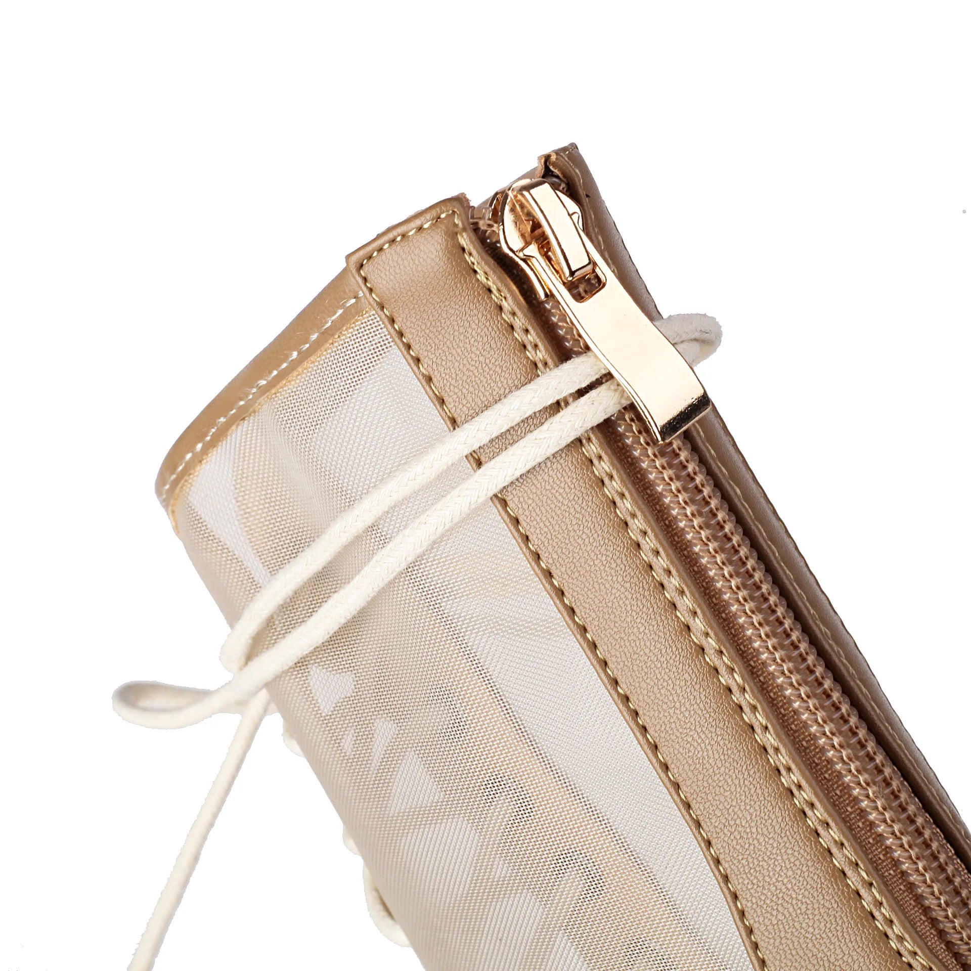Close-up of a beige pouch with a gold zipper