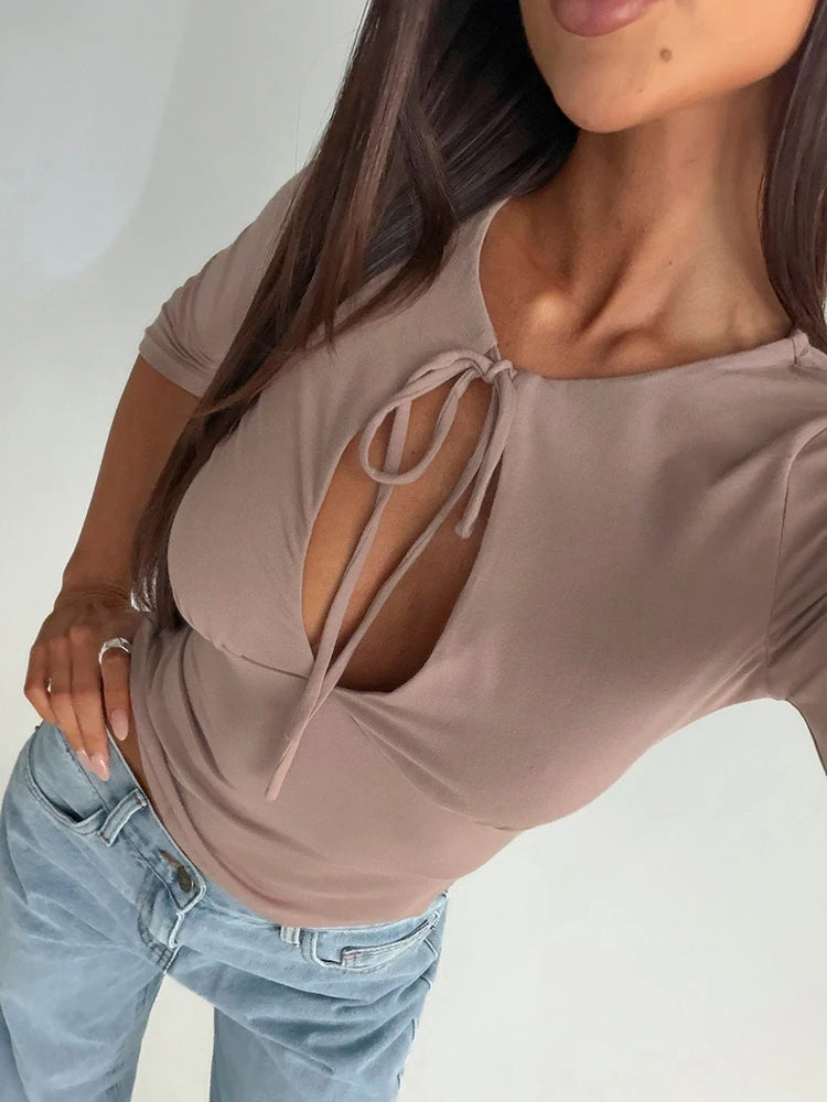 Tie neck cutout three quarter sleeve top