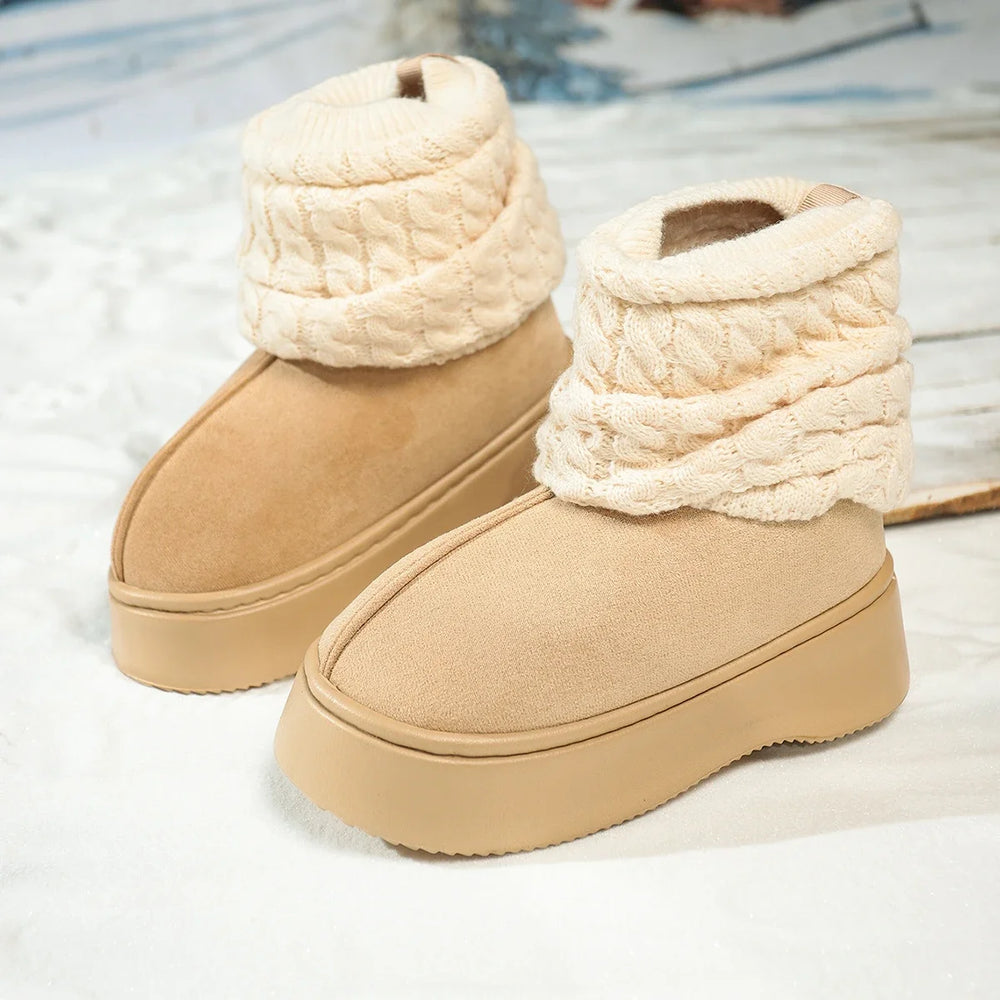 Pair of beige winter boots with knitted cuffs on a light background
