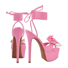 Back view of pink wrap ankle strap platform stiletto sandals