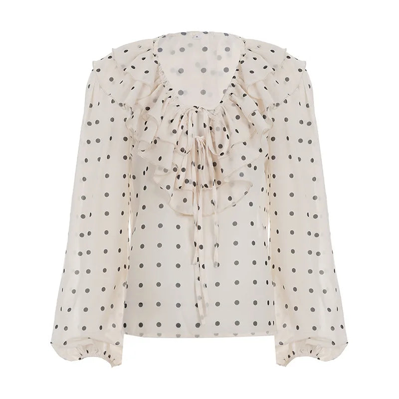 White blouse with black polka dots