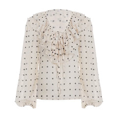 White blouse with black polka dots