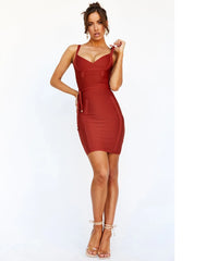 Woman wearing a red bandage dress on a white background