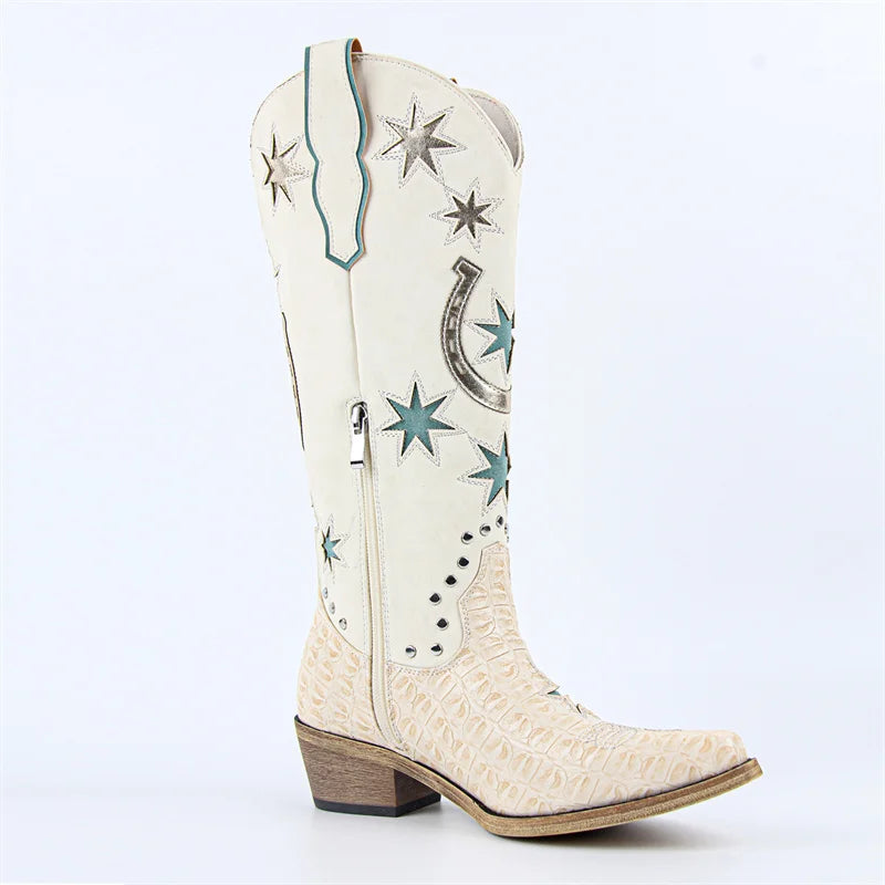 White cowboy boot with star and horseshoe designs on a white background