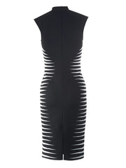 Black dress with cut-out design on a white background