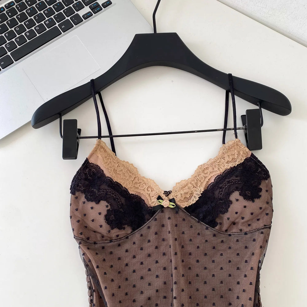 Close-up of Black Polka Dot Lace Strap Top