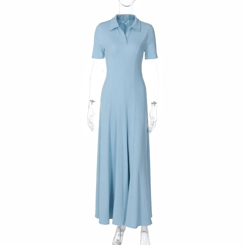 Light blue dress on a mannequin against a white background