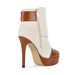 Side view of canvas and brown leather platform stiletto ankle boots showing the zipper closure.