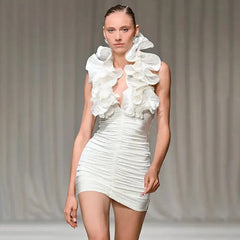 Close-up of ruffled neck halter mini dress