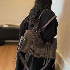 Brown faux leather shoulder bag with lacing details