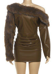 Brown leather dress with fur collar on a mannequin against a white background