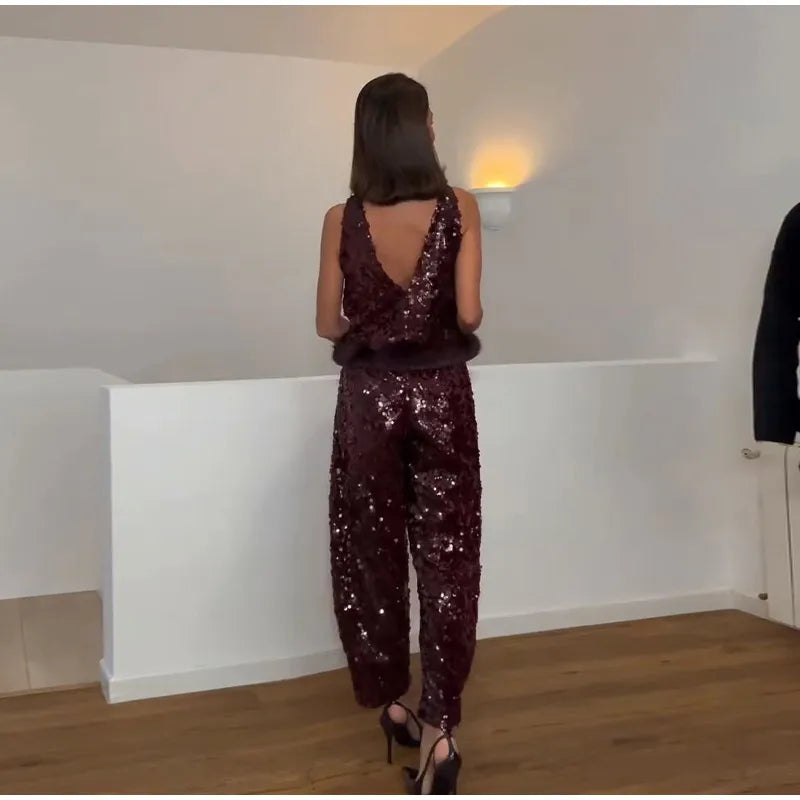 Sequin embellished sleeveless top with fur trim and wide leg pants set, back view.