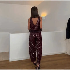 Sequin embellished sleeveless top with fur trim and wide leg pants set, back view.