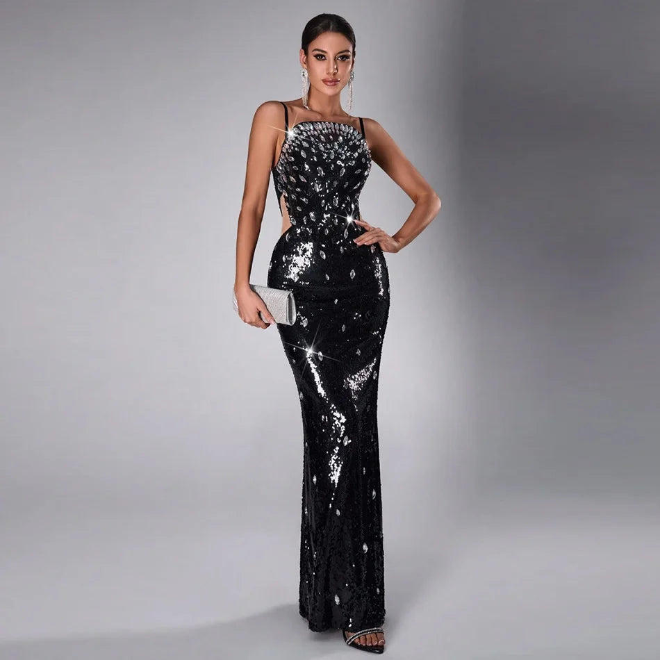 Black sequin evening dress with diamond embellishments on the bodice and cut-out sides