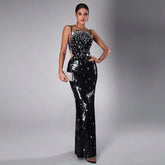 Black sequin evening dress with diamond embellishments on the bodice and cut-out sides
