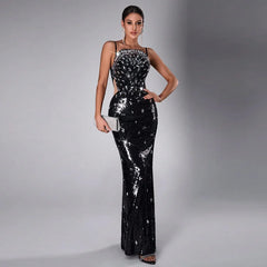 Black sequin evening dress with diamond embellishments on the bodice and cut-out sides