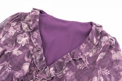 Close-up of ruffled v-neck on floral chiffon maxi dress