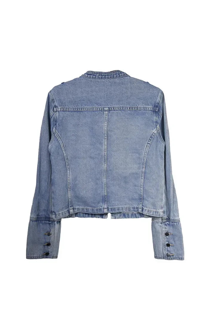 Blue denim jacket on a white background