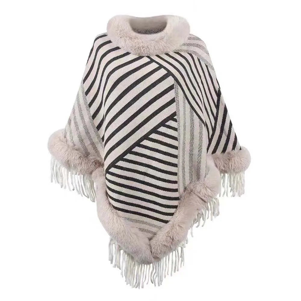 Striped poncho with fringes and fluffy trim on a white background