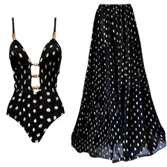 Black and gold polka dot bikini and matching maxi skirt laid out