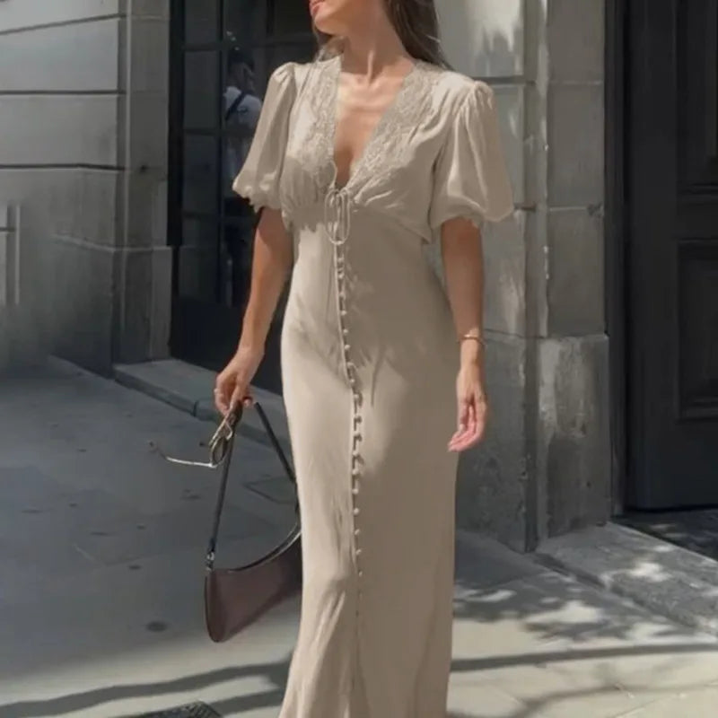 Maxi dress with lace V-neck and puff sleeves