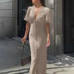 Maxi dress with lace V-neck and puff sleeves